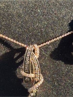 Levian Rose gold chocolate diamond necklace and matching earrings.